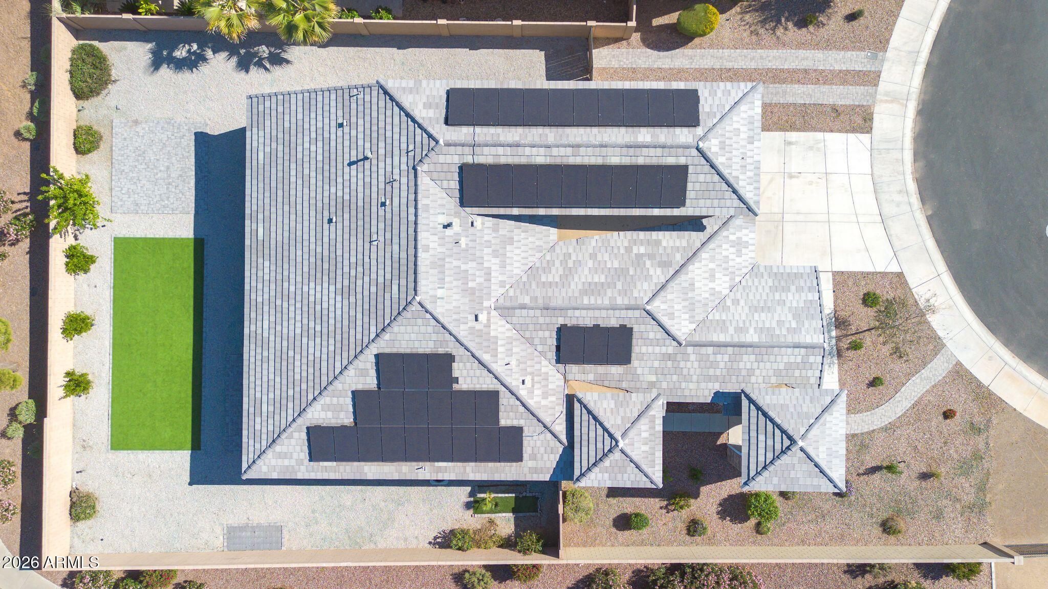 14384 West Hearn Road Surprise, AZ 85379 - Photo 58 of 63 a aerial view of a house with a garden