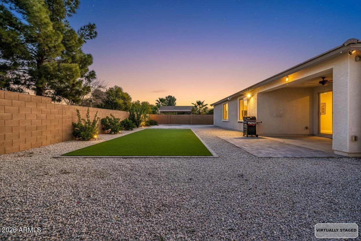 14384 West Hearn Road Surprise, AZ 85379 - Photo 62 of 63 a view of a house with a yard