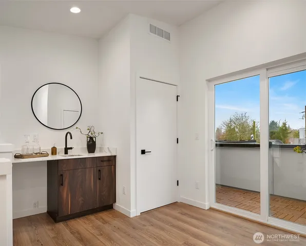 a view of a bathroom sink and a mirror