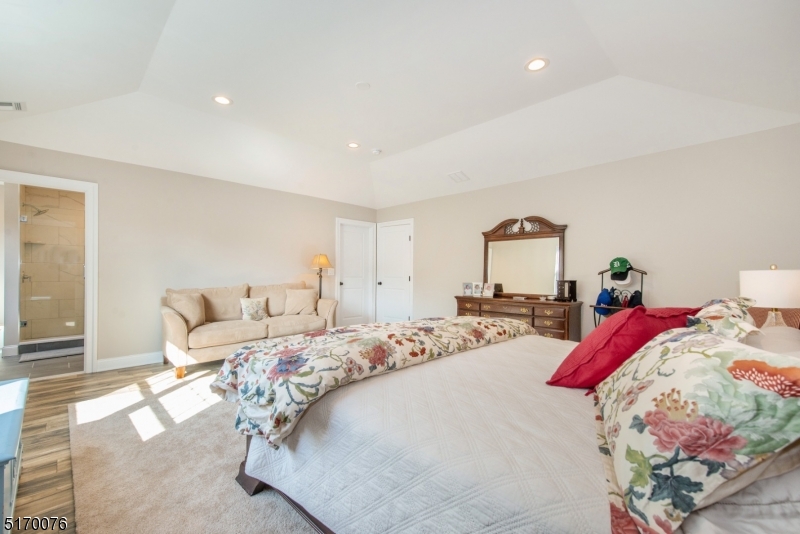 6 Elm Street, Unit 10 Madison, NJ 07940 - Photo 14 of 15 a bedroom with a bed and window
