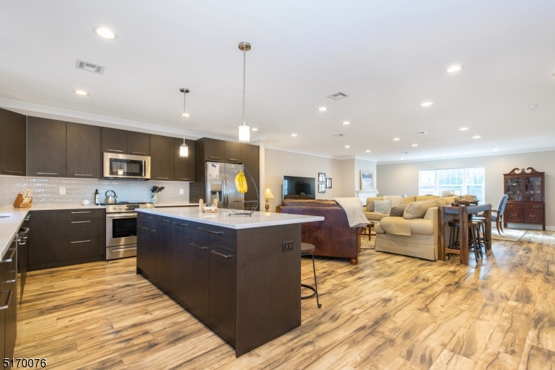 6 Elm Street, Unit 10 Madison, NJ 07940 - Photo 2 of 15 a large kitchen with stainless steel appliances lots of counter top space