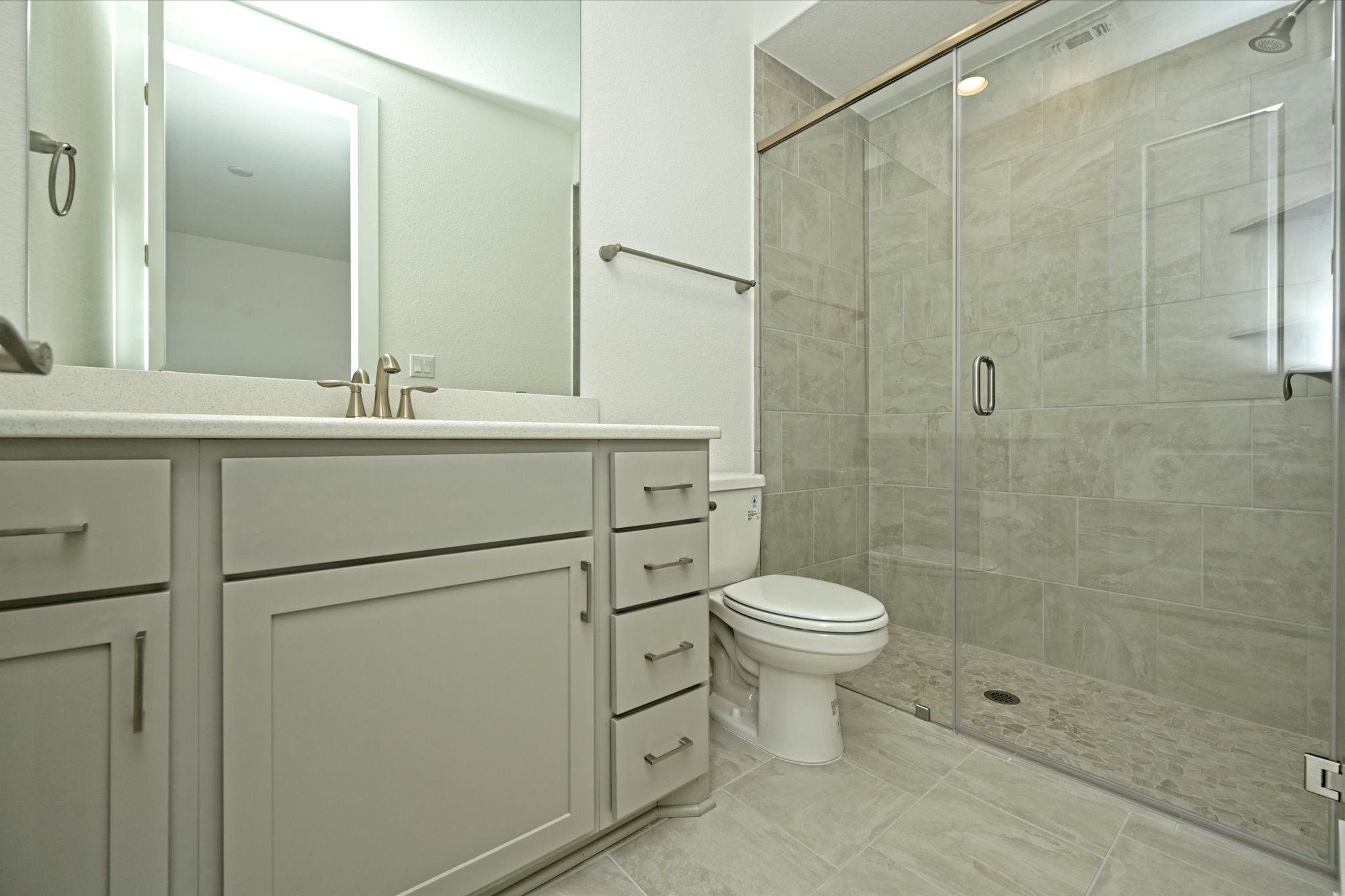 209 Scofield Avenue Georgetown, TX 78626 - Photo 24 of 33 a bathroom with a toilet a sink and shower