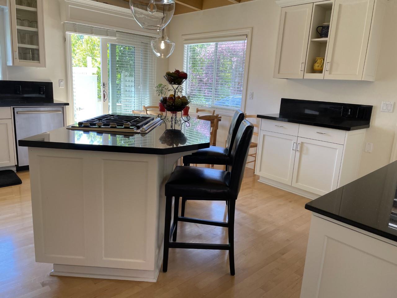 14 Oak Road Santa Cruz, CA 95060 - Photo 20 of 53 a kitchen with granite countertop a sink and cabinets