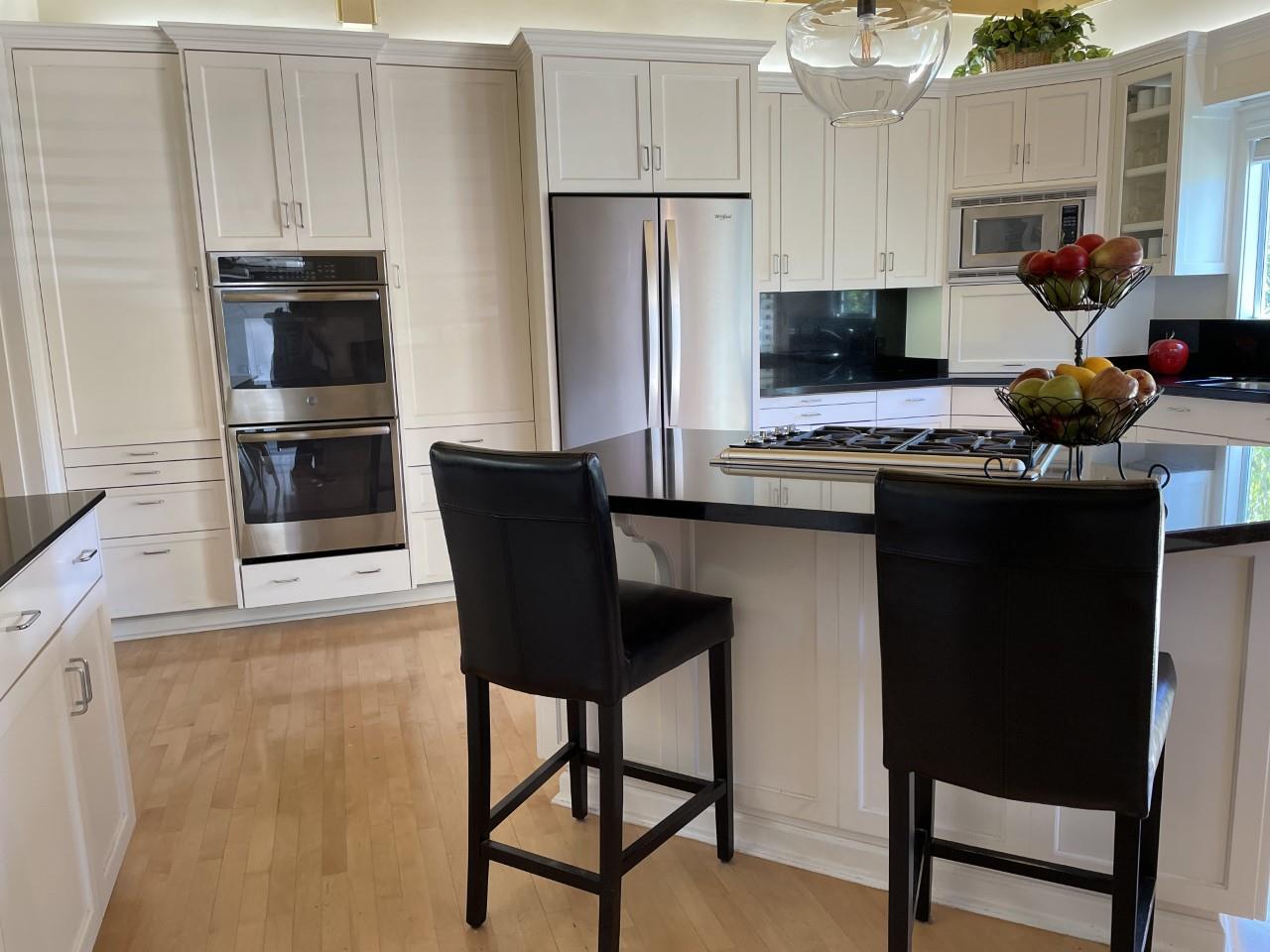 14 Oak Road Santa Cruz, CA 95060 - Photo 21 of 53 a kitchen with stainless steel appliances a stove a refrigerator and cabinets