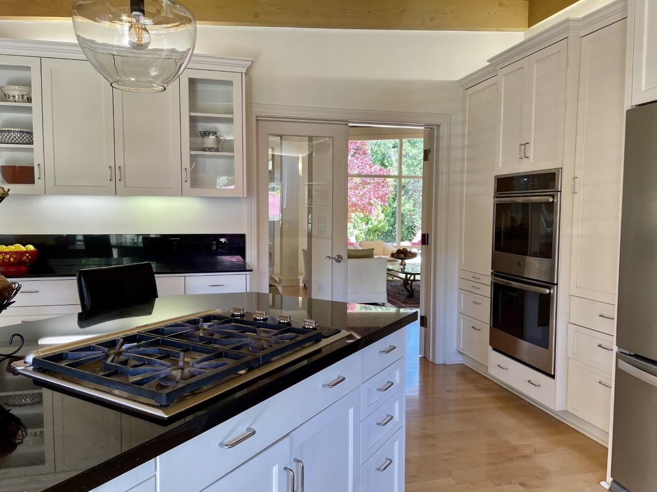 14 Oak Road Santa Cruz, CA 95060 - Photo 28 of 53 a kitchen with stainless steel appliances granite countertop a stove and a refrigerator