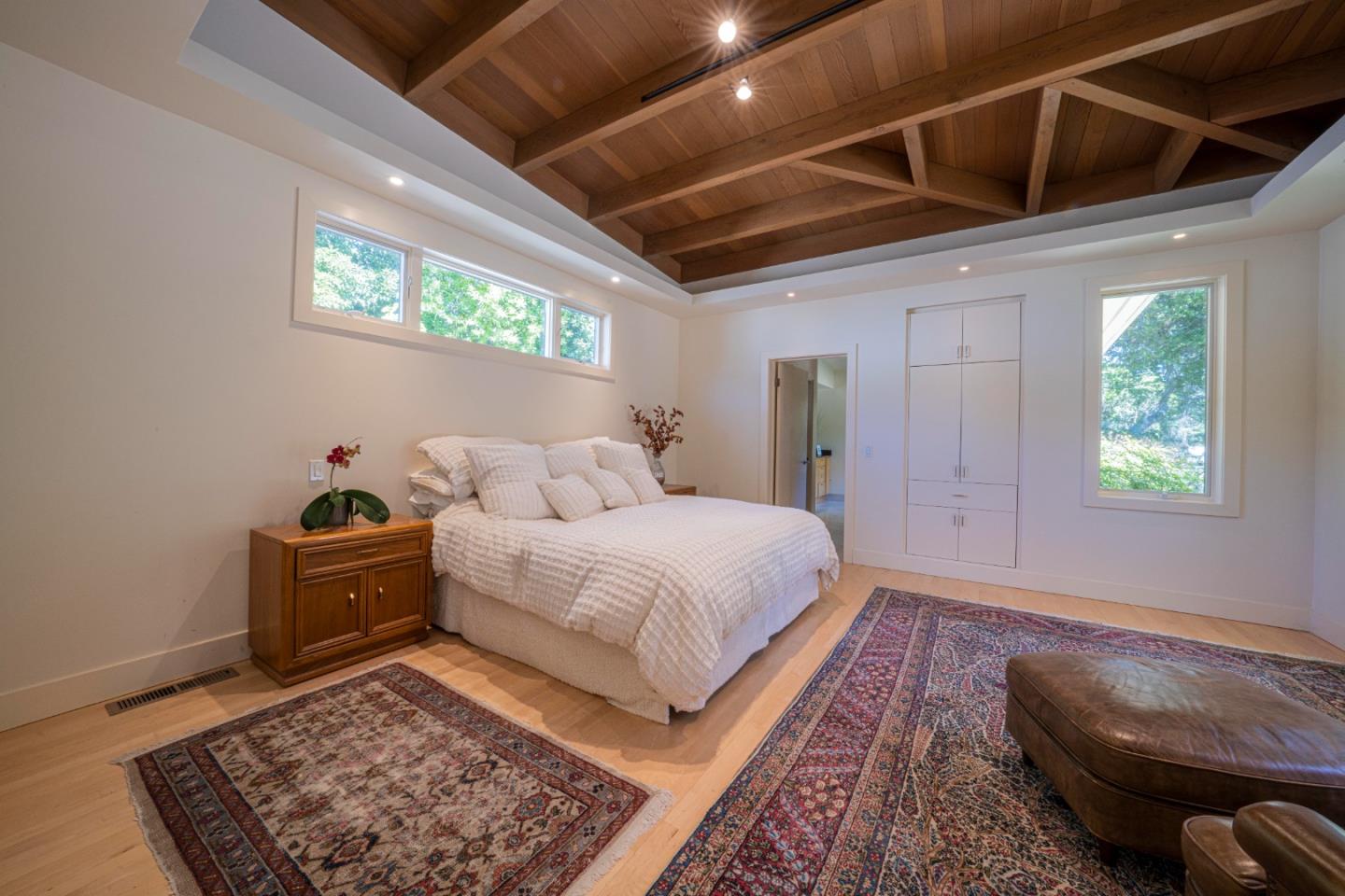 14 Oak Road Santa Cruz, CA 95060 - Photo 29 of 53 a spacious bedroom with a bed and a couch