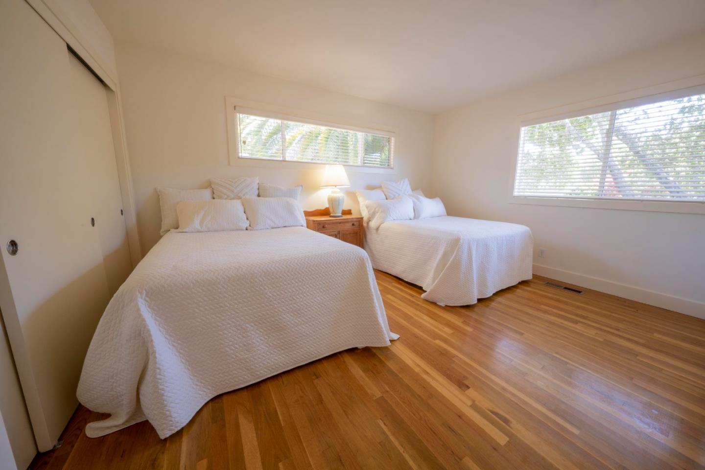 14 Oak Road Santa Cruz, CA 95060 - Photo 38 of 53 a bedroom with two beds and wooden floor