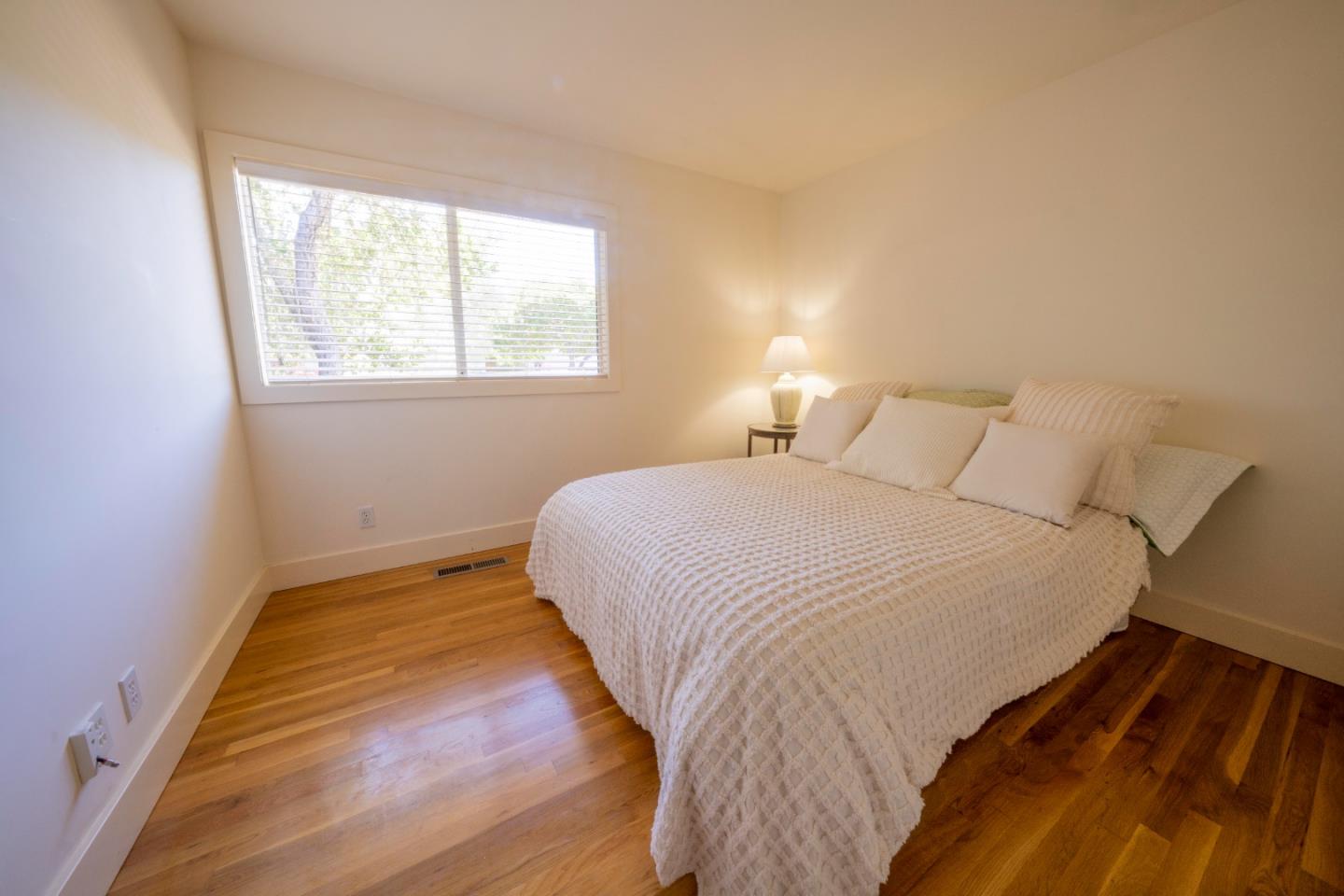 14 Oak Road Santa Cruz, CA 95060 - Photo 39 of 53 a bedroom with a bed and a window