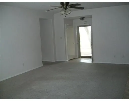 a view of empty room with a window