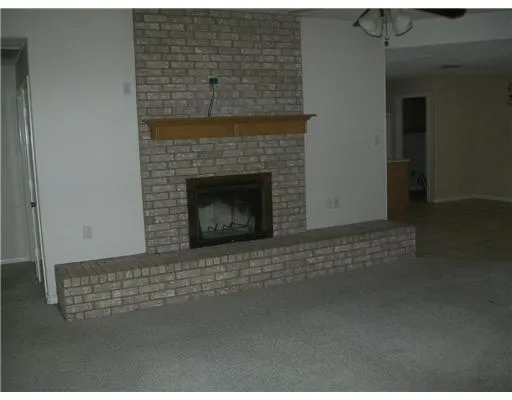 a living room with a fireplace