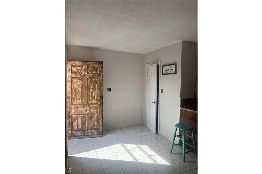 10924 Rincon Drive Whittier, CA 90606 - Photo 15 of 27 a view of livingroom with hardwood floor and bathroom