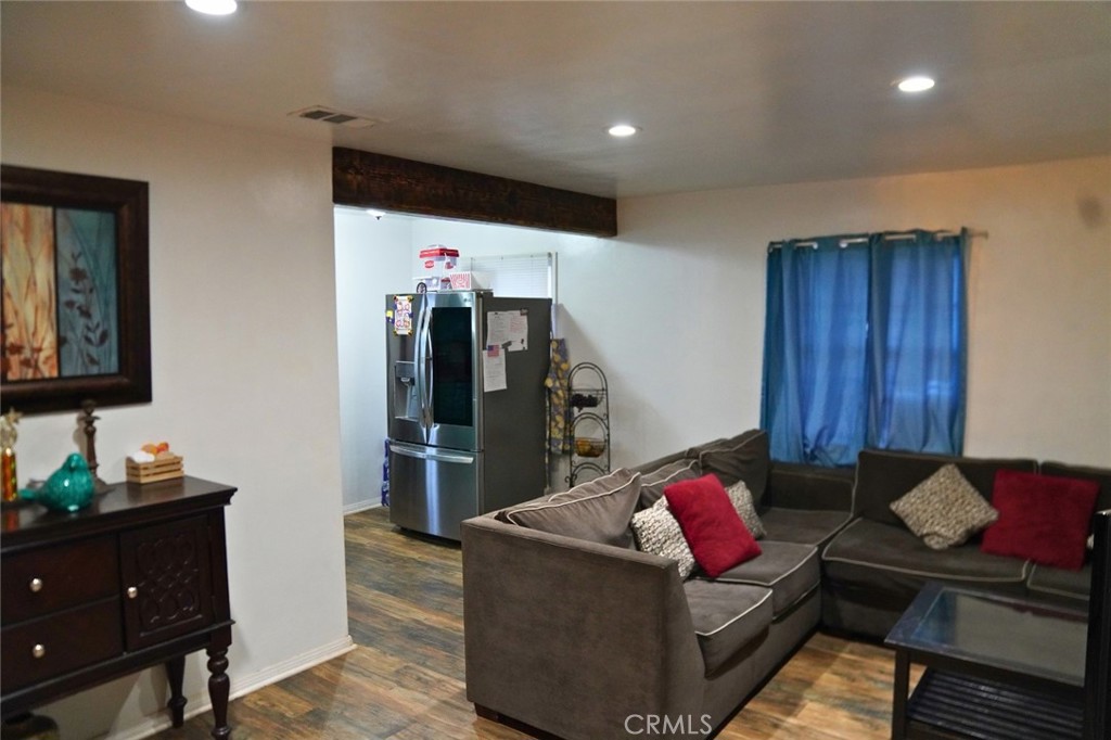 10924 Rincon Drive Whittier, CA 90606 - Photo 20 of 27 a living room with furniture and wooden floor