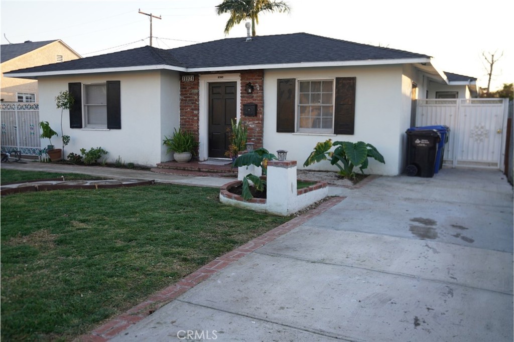 10924 Rincon Drive Whittier, CA 90606 - Photo 3 of 27 a front view of a house with garden