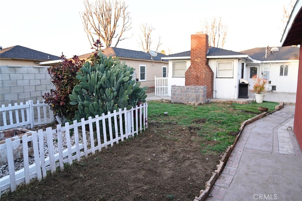 10924 Rincon Drive Whittier, CA 90606 - Photo 5 of 27 a front view of a house with yard