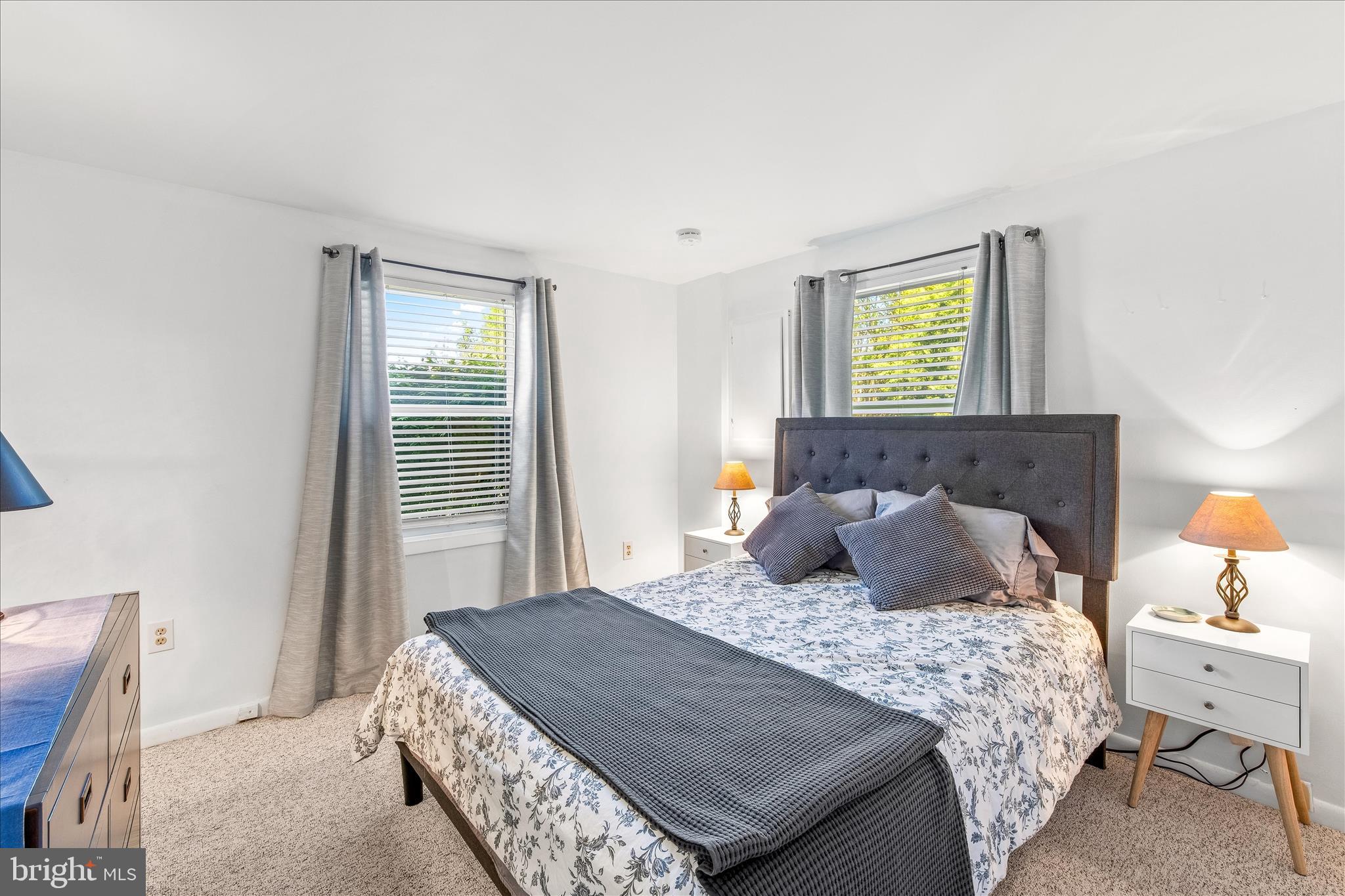 21406 Dogwood Cove Road Tilghman, MD 21671 - Photo 31 of 68 a bedroom with a bed and a window