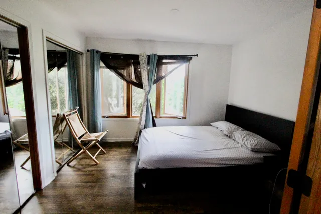 a bathroom with a tub and a shower