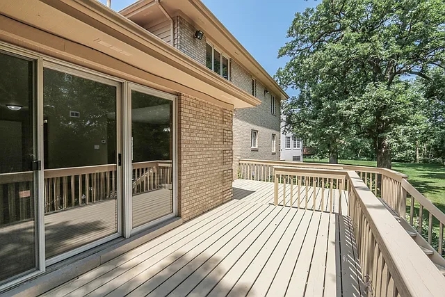 6 Allegheny Court Bolingbrook, IL 60440 - Photo 37 of 38 a view of balcony with wooden floor and fence