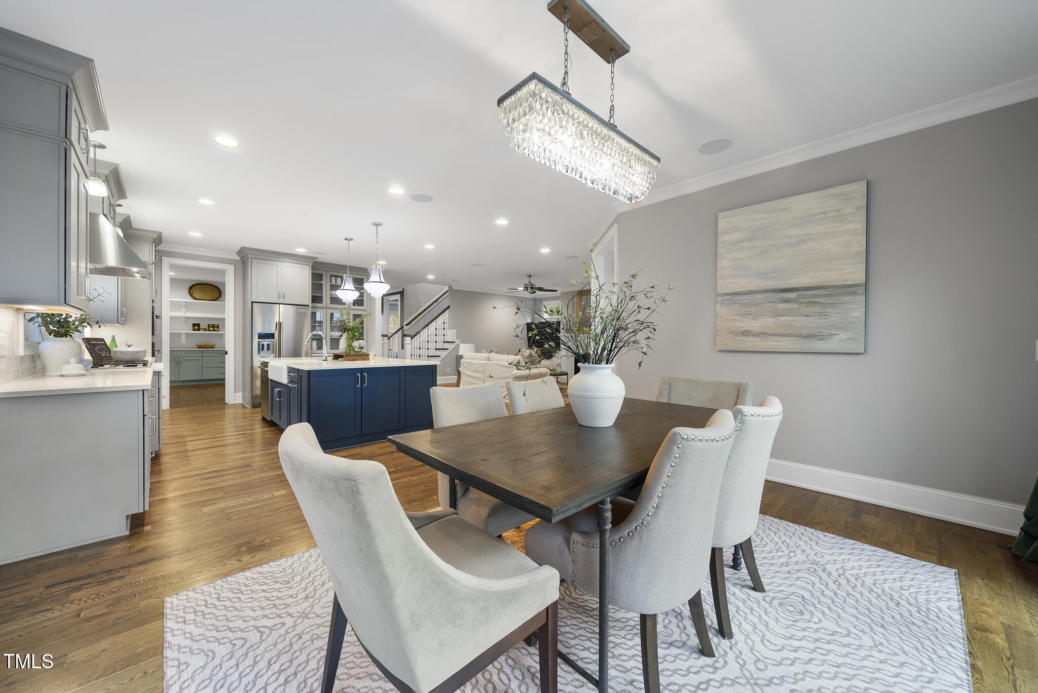 1306 Mordecai Drive Raleigh, NC 27604 - Photo 12 of 78 a view of a dining room with furniture and wooden floor