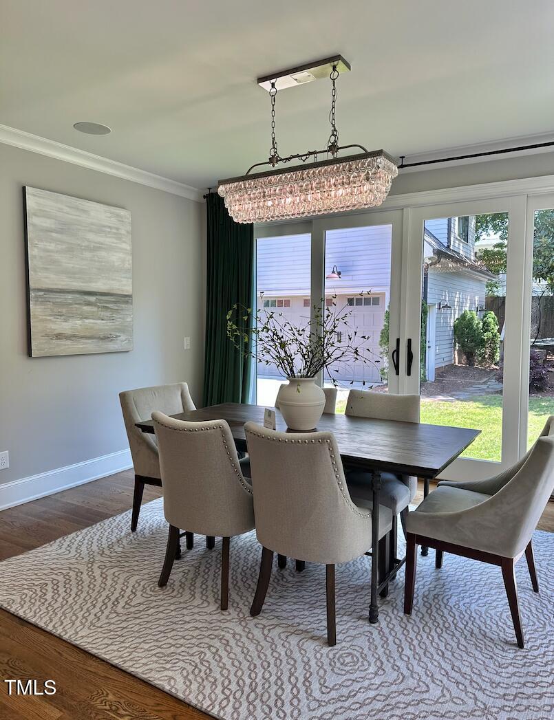 1306 Mordecai Drive Raleigh, NC 27604 - Photo 24 of 78 a view of a dining room with furniture window and outside view