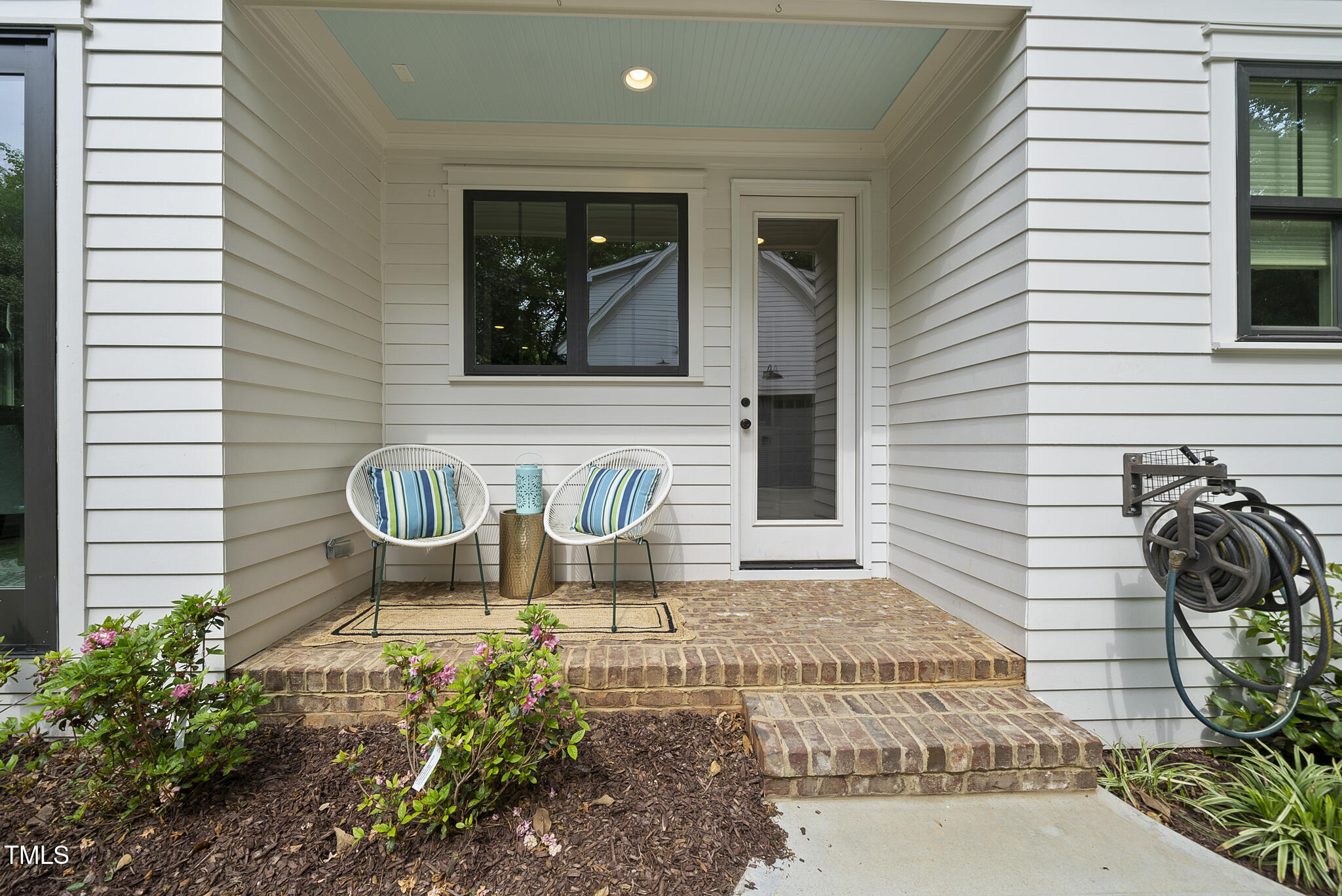 1306 Mordecai Drive Raleigh, NC 27604 - Photo 57 of 78 a view of a chairs and table in backyard