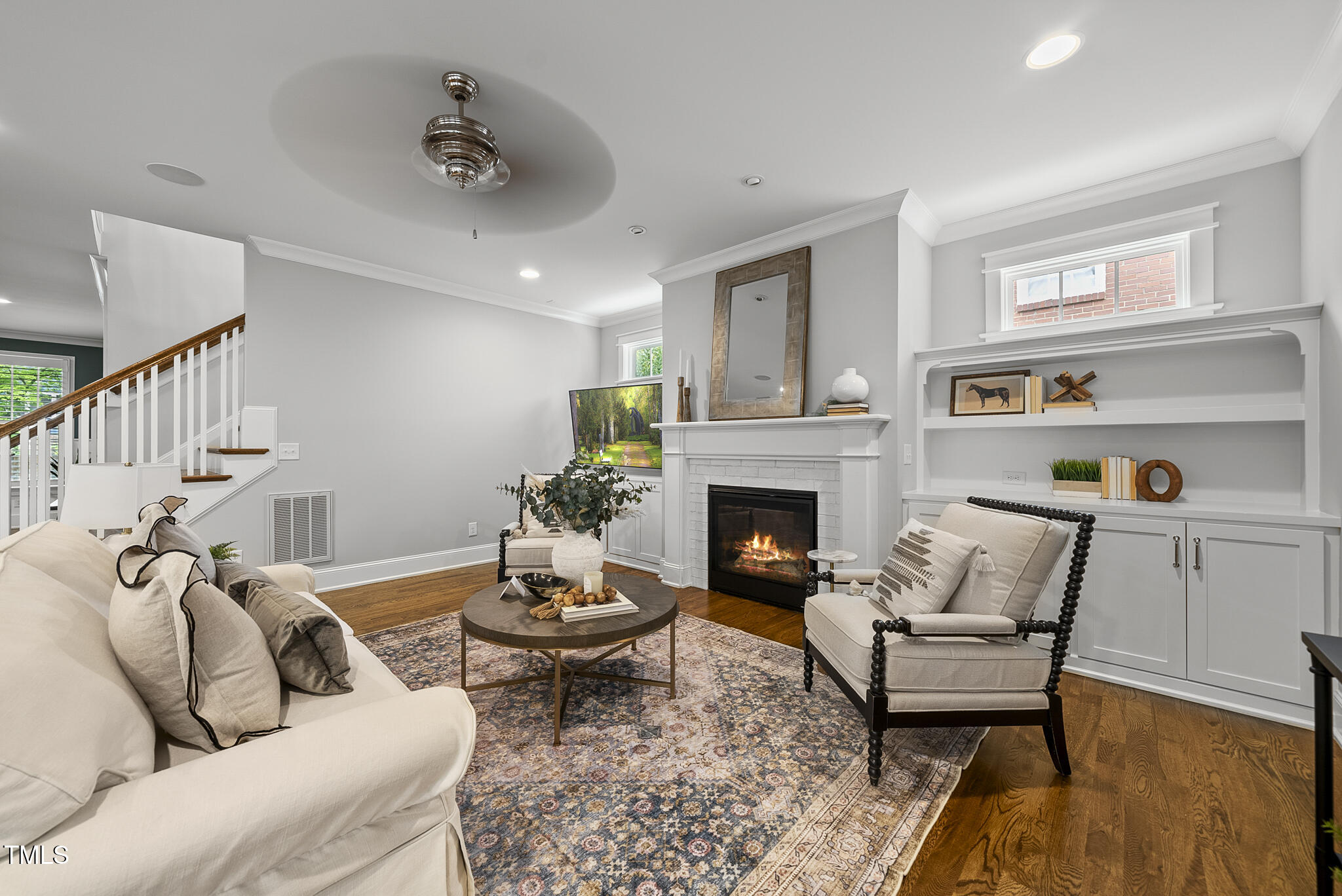 1306 Mordecai Drive Raleigh, NC 27604 - Photo 7 of 78 a living room with furniture and a fireplace