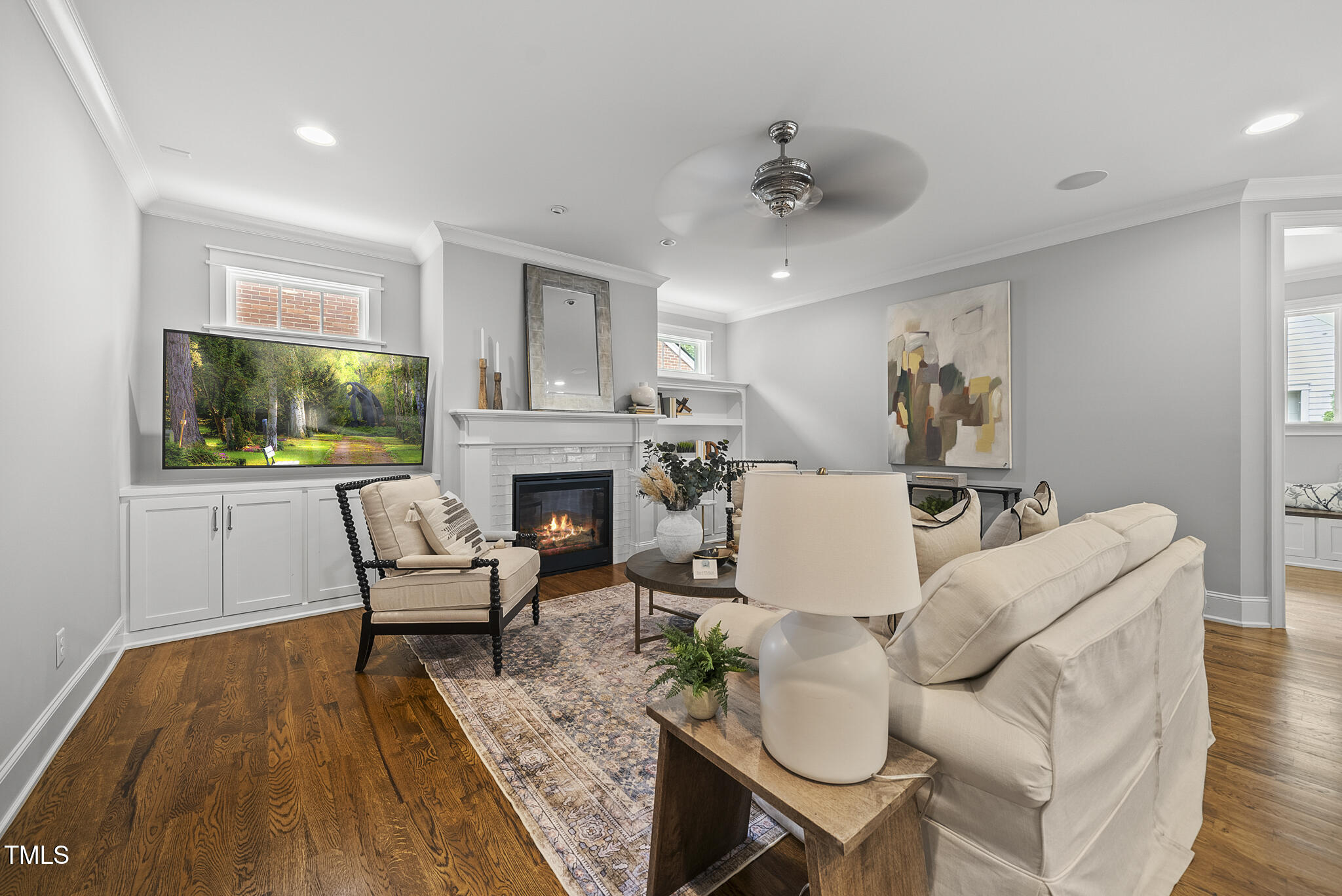 1306 Mordecai Drive Raleigh, NC 27604 - Photo 8 of 78 a living room with furniture and a fireplace