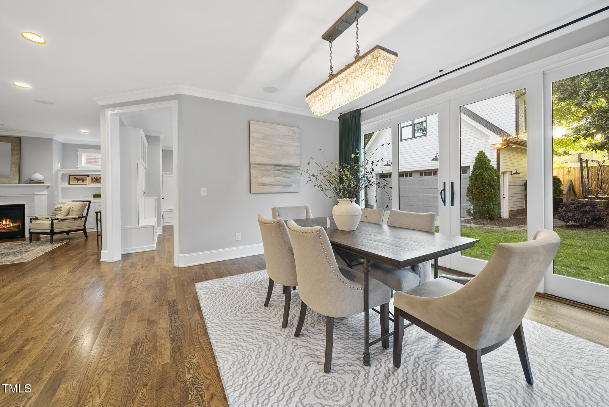 1306 Mordecai Drive Raleigh, NC 27604 - Photo 9 of 78 a view of a dining room with furniture and wooden floor