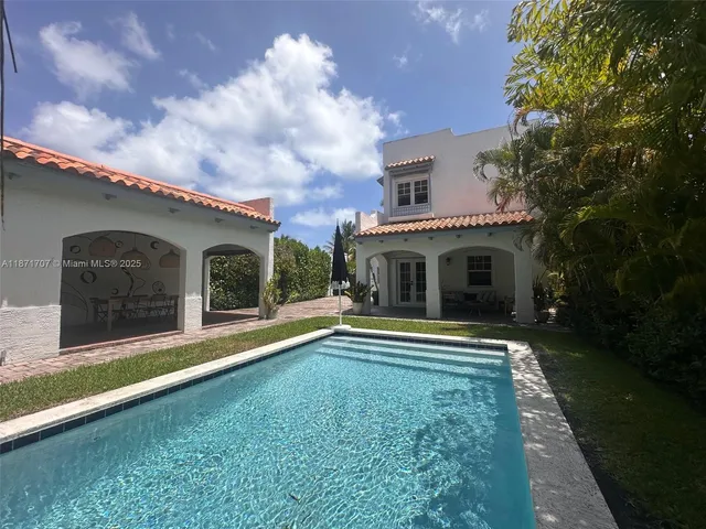 a view of a terrace with sitting area