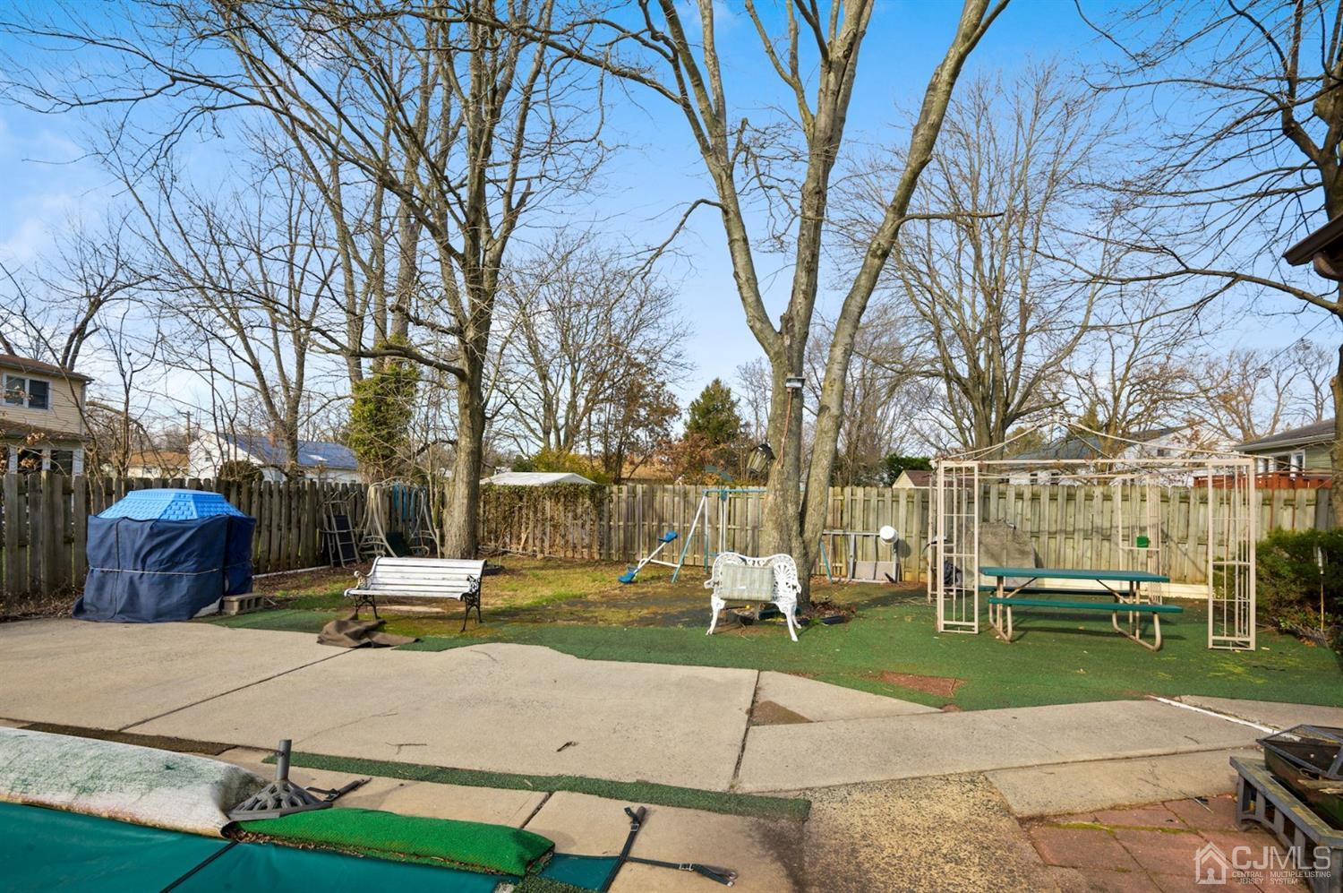 24 Partch Place Edison, NJ 08817 - Photo 22 of 22 a park view with a bench plants and trees