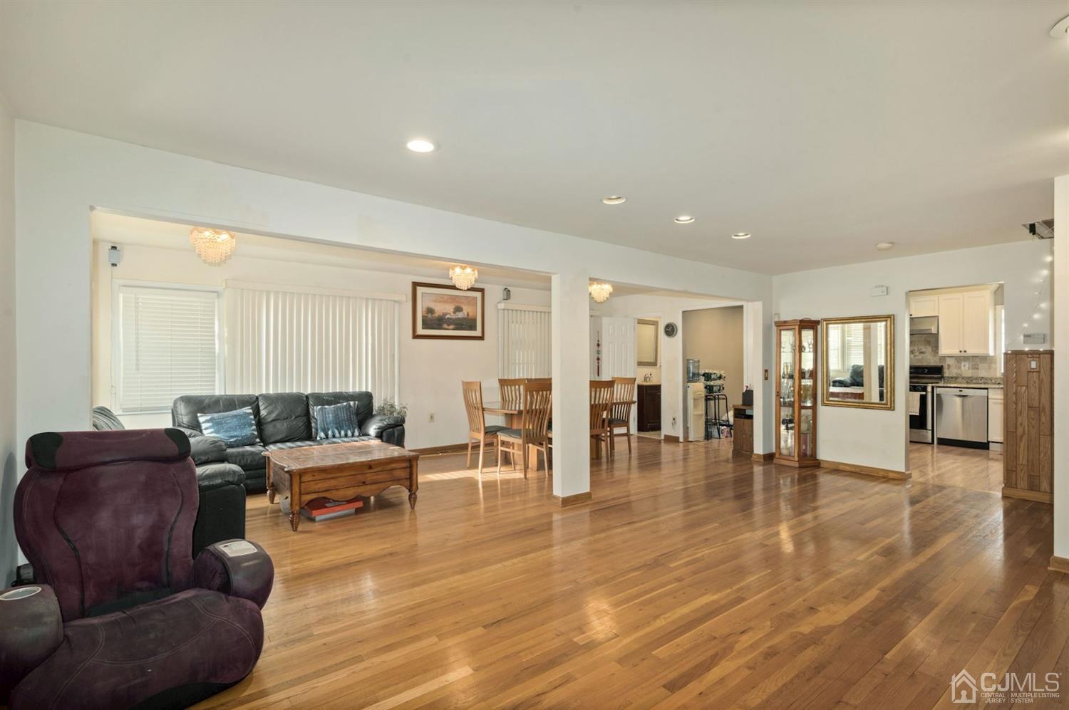 24 Partch Place Edison, NJ 08817 - Photo 6 of 22 a living room with furniture and wooden floor