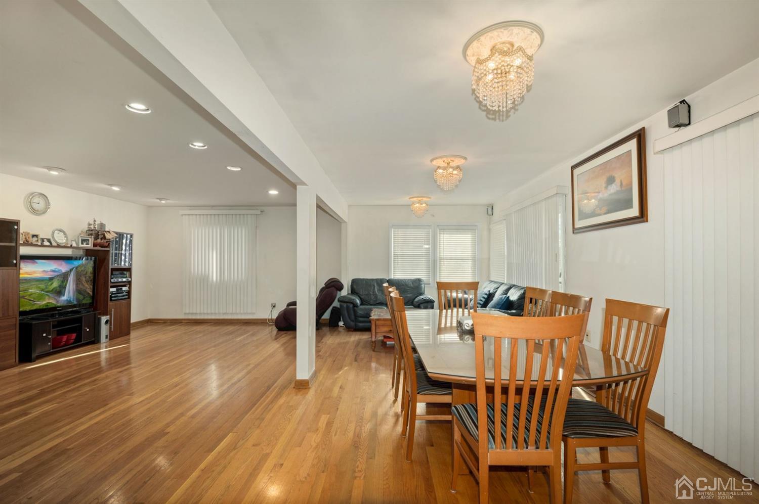 24 Partch Place Edison, NJ 08817 - Photo 7 of 22 a view of a dining room with furniture and wooden floor