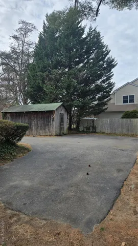 a view of house with outdoor space