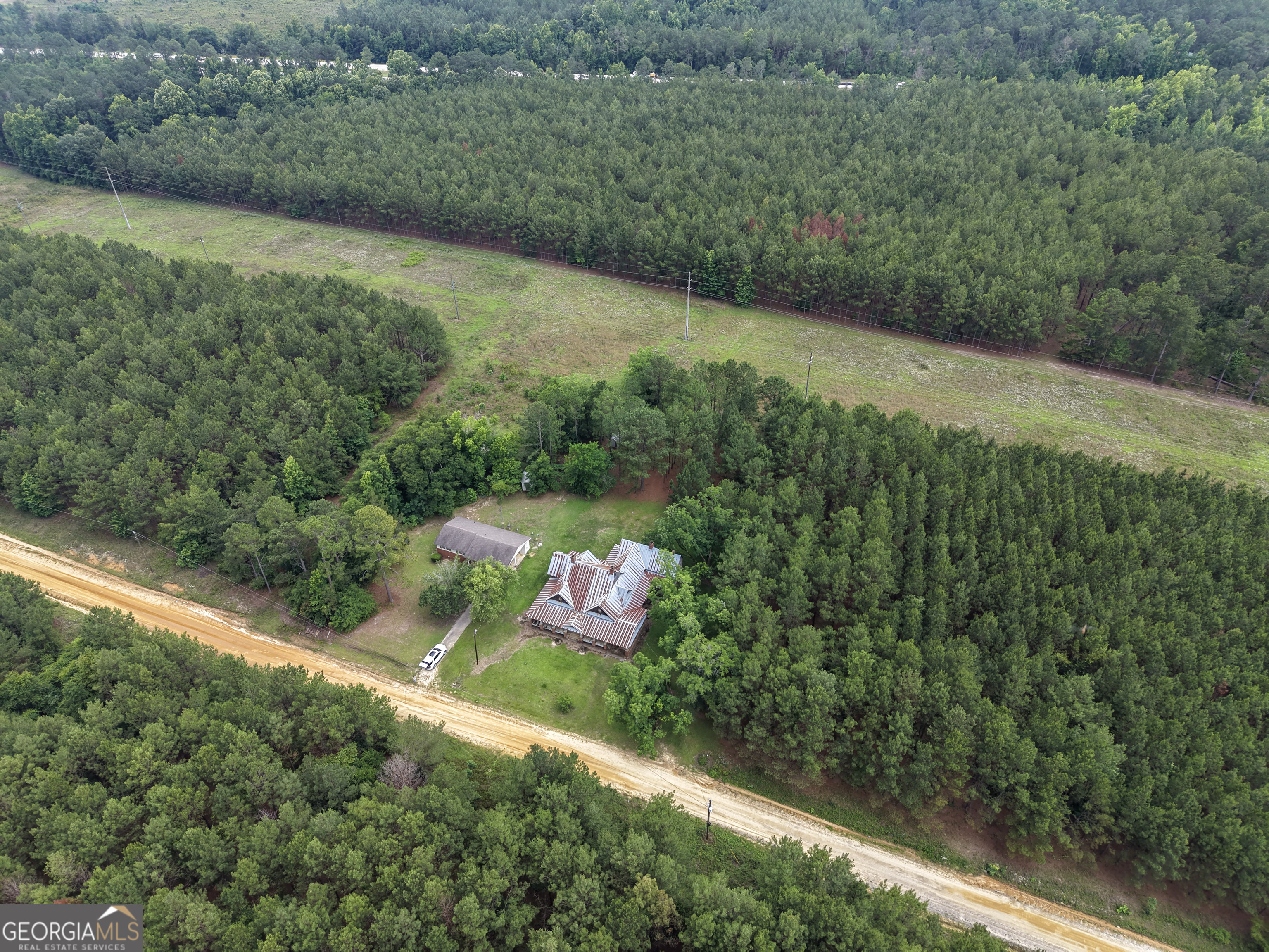 1869 Minter Blue Springs Road Rockledge, GA 30454 - Photo 6 of 45 a view of a yard with plants