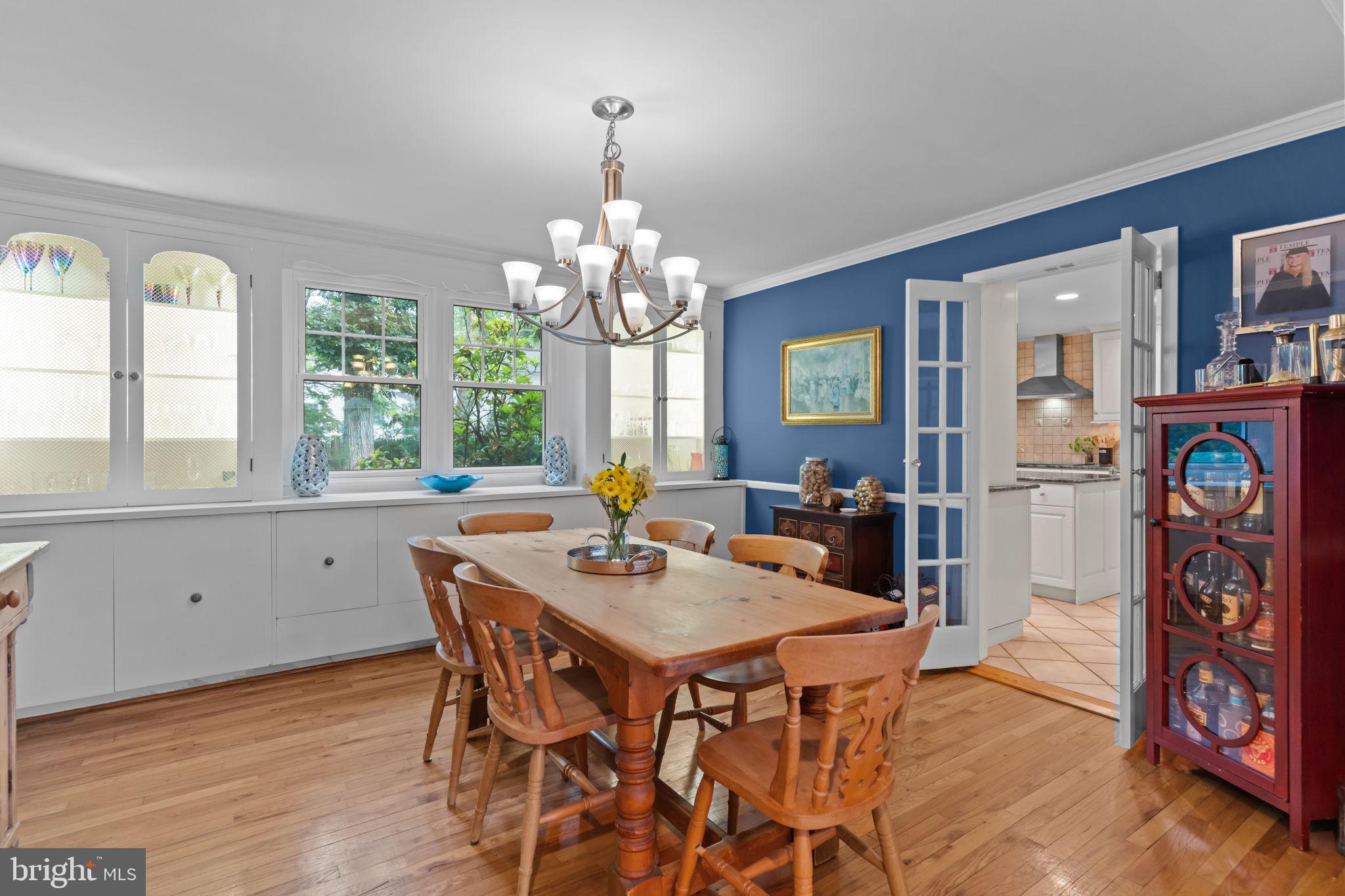 4 Keats Road Yardley, PA 19067 - Photo 13 of 65 a view of a dining room with furniture a chandelier and wooden floor
