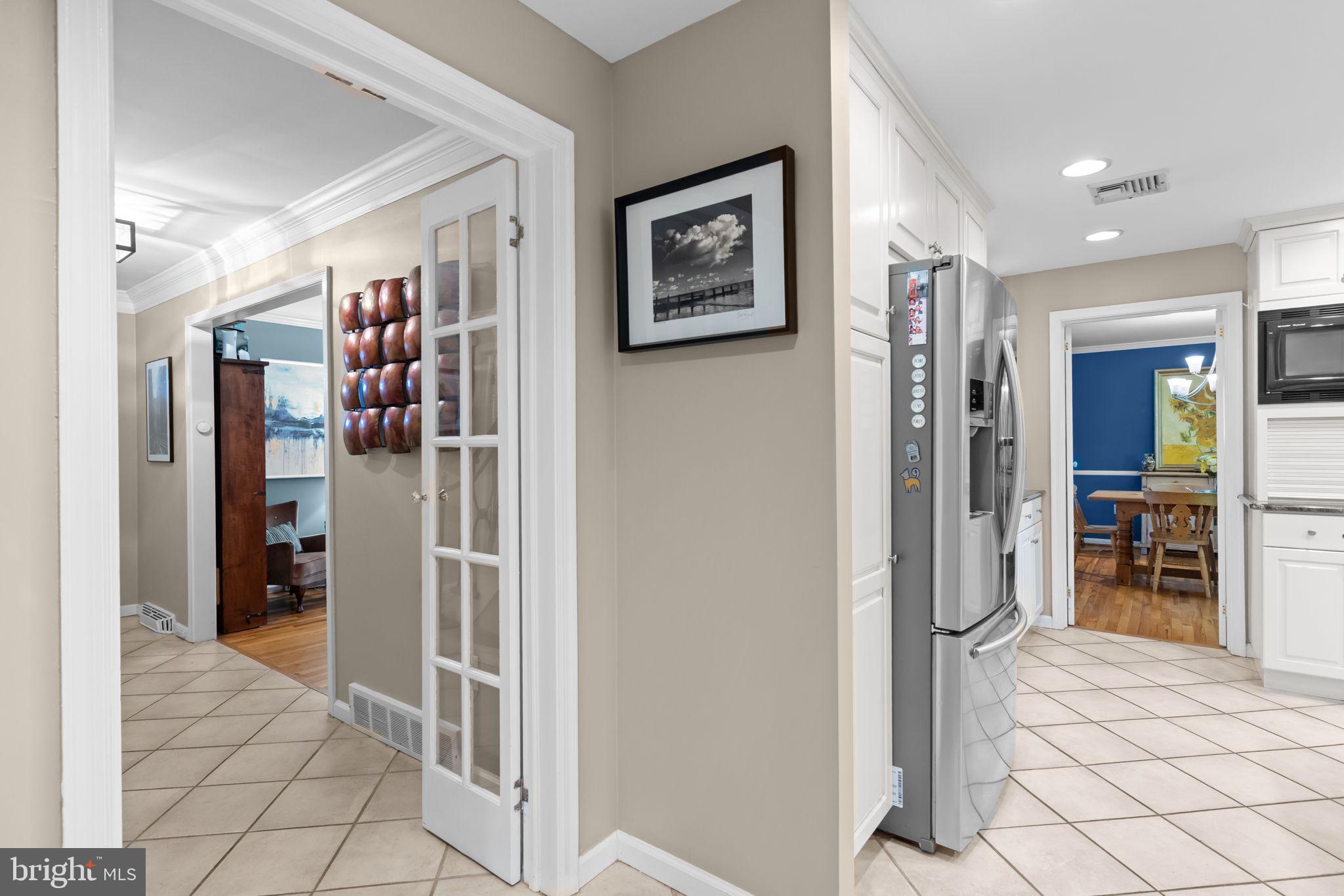 4 Keats Road Yardley, PA 19067 - Photo 19 of 65 a view of a hallway with closet and a bathroom
