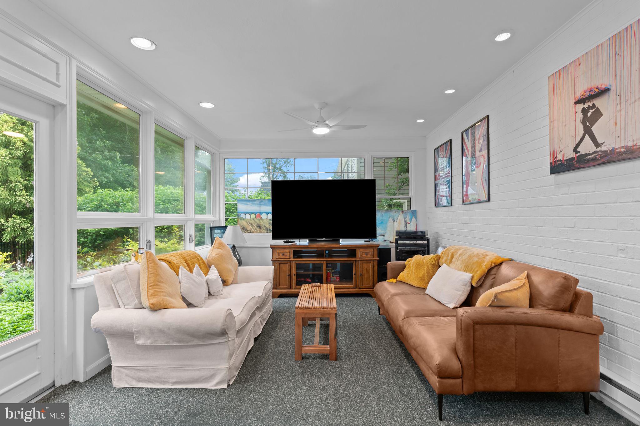 4 Keats Road Yardley, PA 19067 - Photo 28 of 65 a living room with furniture and a flat screen tv