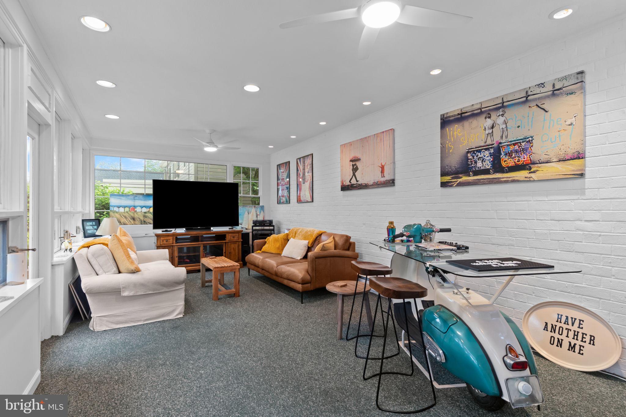 4 Keats Road Yardley, PA 19067 - Photo 30 of 65 a living room with furniture and a flat screen tv