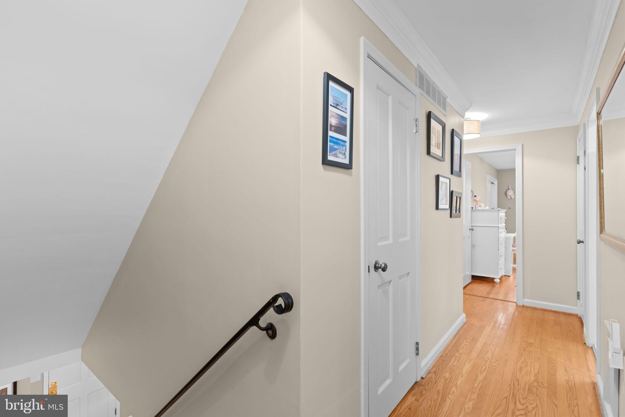 4 Keats Road Yardley, PA 19067 - Photo 33 of 65 a view of a hallway with a wooden floor