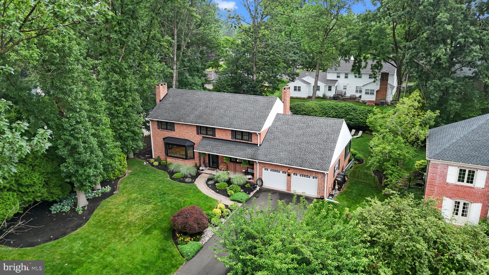4 Keats Road Yardley, PA 19067 - Photo 56 of 65 an aerial view of house with yard and trees in the background