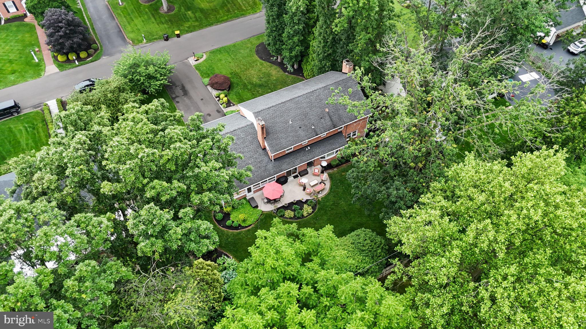 4 Keats Road Yardley, PA 19067 - Photo 62 of 65 an aerial view of a house with a yard and garden