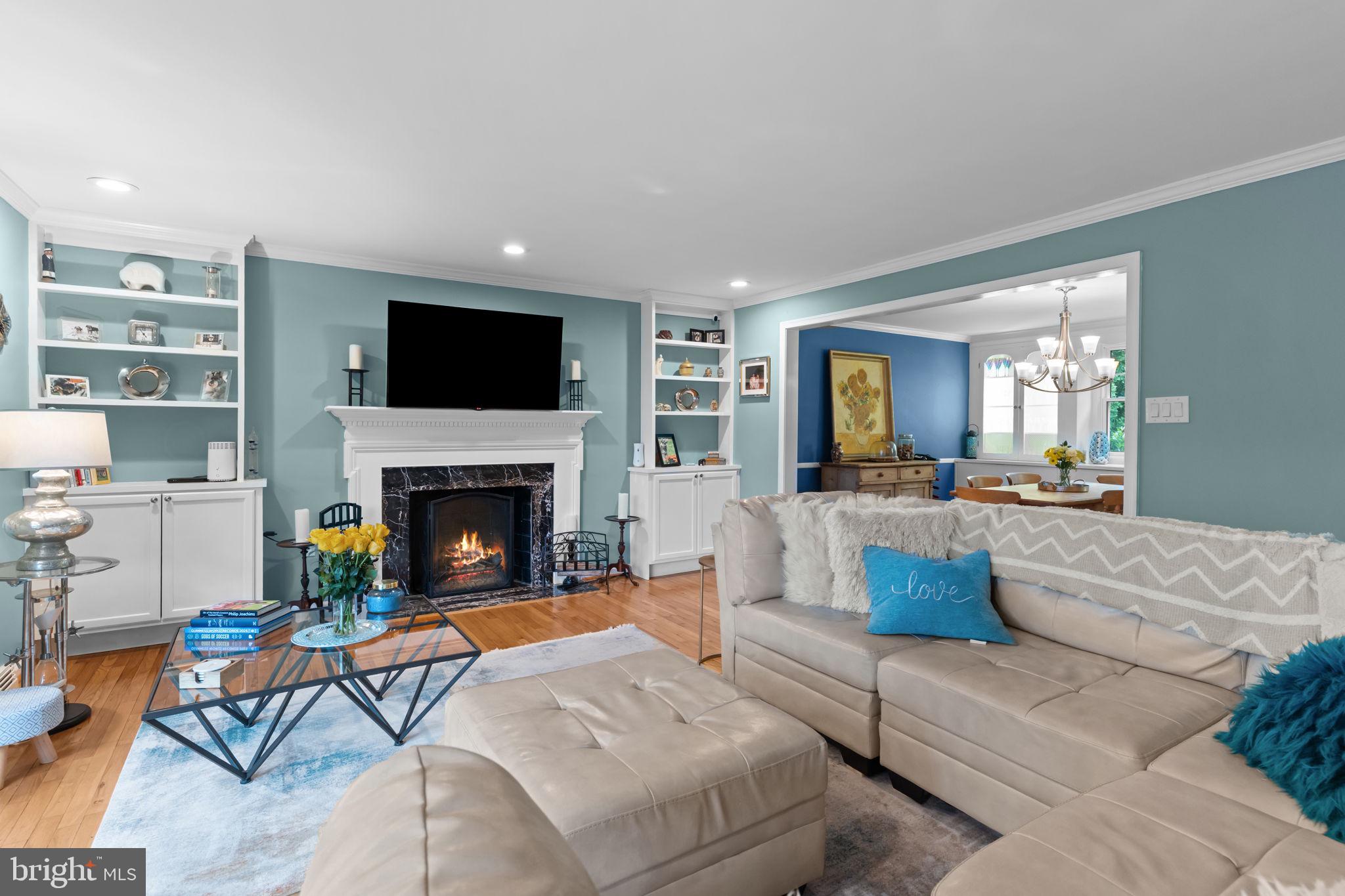 4 Keats Road Yardley, PA 19067 - Photo 8 of 65 a living room with furniture fireplace and flat screen tv