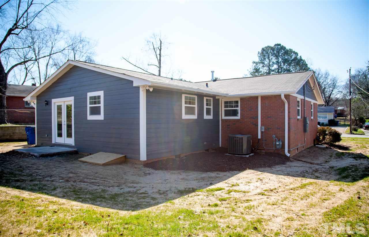 833 Newcombe Road Raleigh, NC 27610 - Photo 23 of 25 a view of a house with a yard