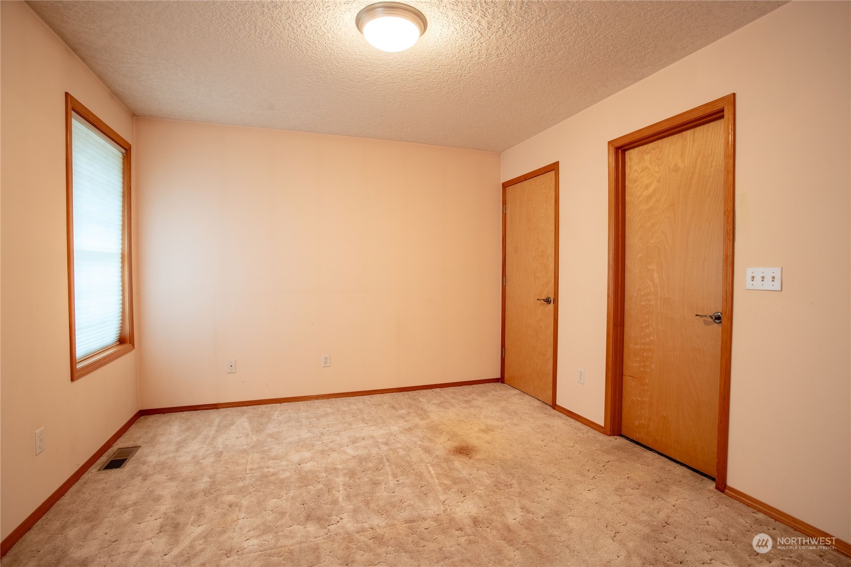 1847 Southwest Snively Avenue Chehalis, WA 98532 - Photo 17 of 32 an empty room with windows