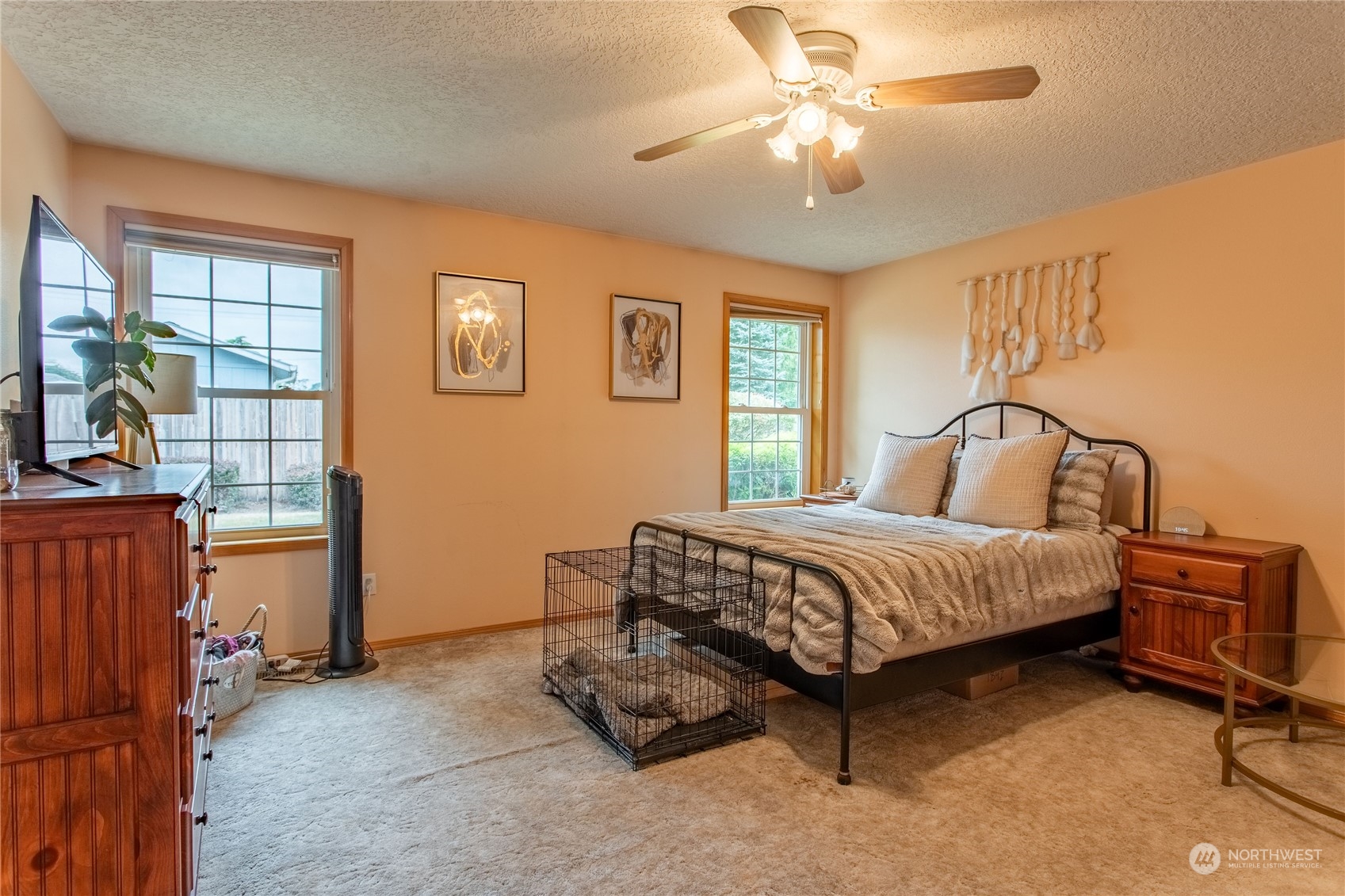 1847 Southwest Snively Avenue Chehalis, WA 98532 - Photo 10 of 32 a bedroom with a bed and a chandelier