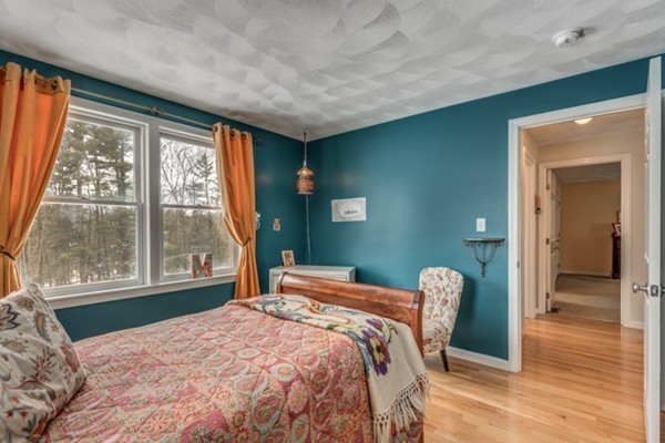 28 Turnpike Road Ipswich, MA 01938 - Photo 16 of 28 a bedroom with a bed and a large window