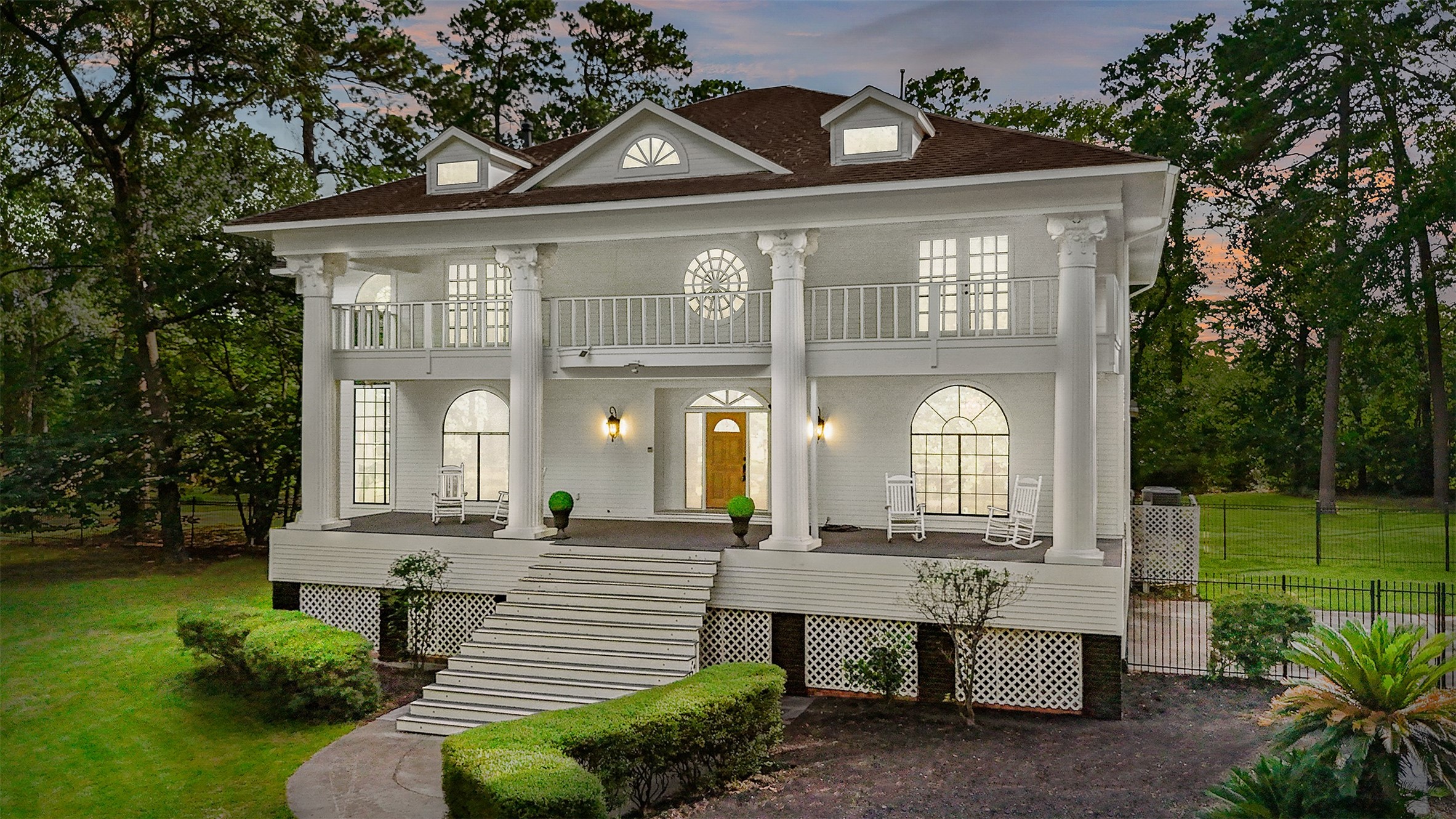 17003 Creeksouth Road Houston, TX 77068 - Photo 1 of 49 A commanding presence with timeless appeal, this architectural gem features soaring columns, an expansive front porch, and a sweeping upper-level balcony that spans the home’s width.