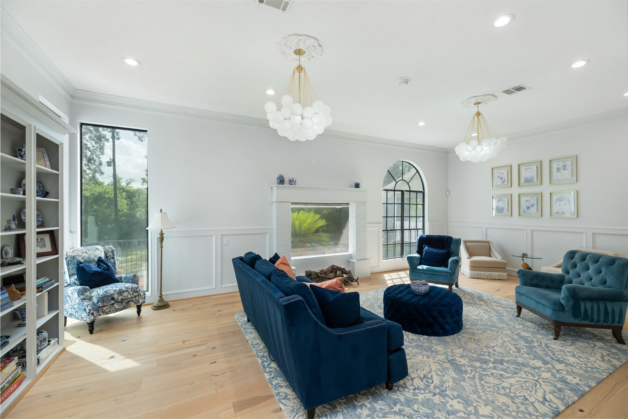 17003 Creeksouth Road Houston, TX 77068 - Photo 14 of 49 A spacious layout invites both relaxation and entertaining, with ample room for gathering friends or enjoying quiet moments. Natural light from oversized windows enhances the airy, open feel of this versatile living space.