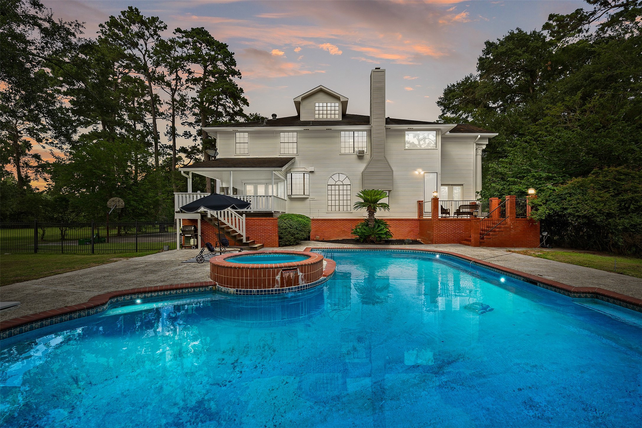 17003 Creeksouth Road Houston, TX 77068 - Photo 2 of 49 With room to lounge, dine, and unwind, this private outdoor retreat invites lasting memories—from summer celebrations to quiet mornings with coffee.