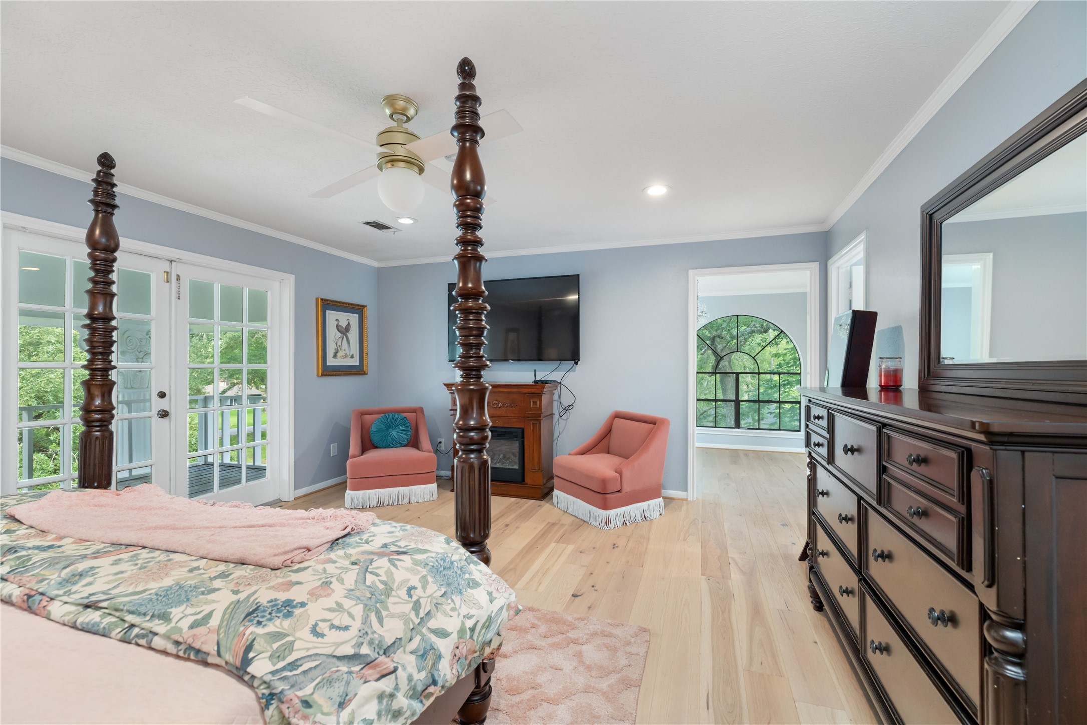 17003 Creeksouth Road Houston, TX 77068 - Photo 27 of 49 Large windows frame serene views while the open layout invites endless possibilities for comfort and style.