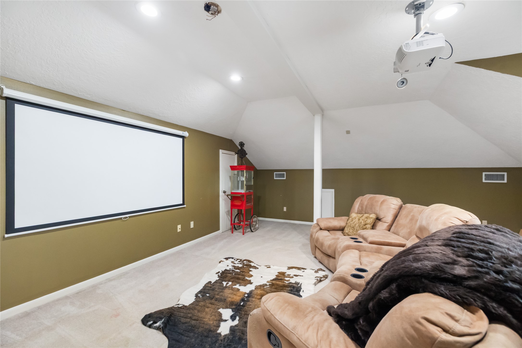 17003 Creeksouth Road Houston, TX 77068 - Photo 36 of 49 Tucked away on the third floor, this private media room offers the perfect escape for movie nights, game days, or relaxed entertaining. Spacious and quiet, it’s a dedicated retreat designed for comfort and connection.